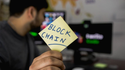 Blockchain written on a piece of paper.