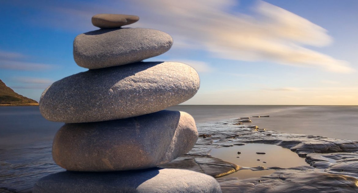 Mindfulness. A stack of rocks near the sea.