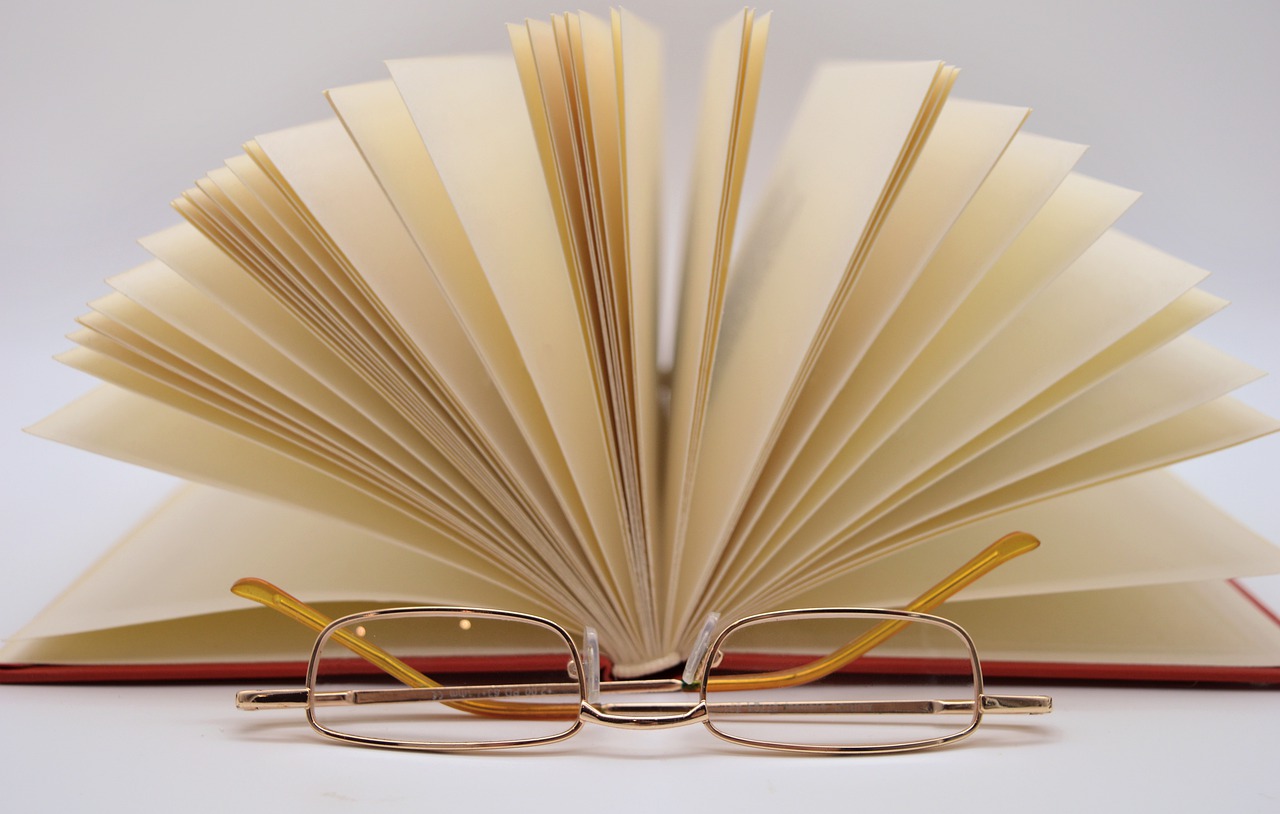 Book open with glasses in front for World Book Day