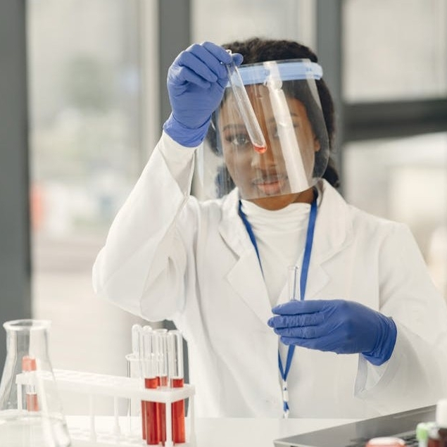 A scientist doing an experiment, furthering open science.