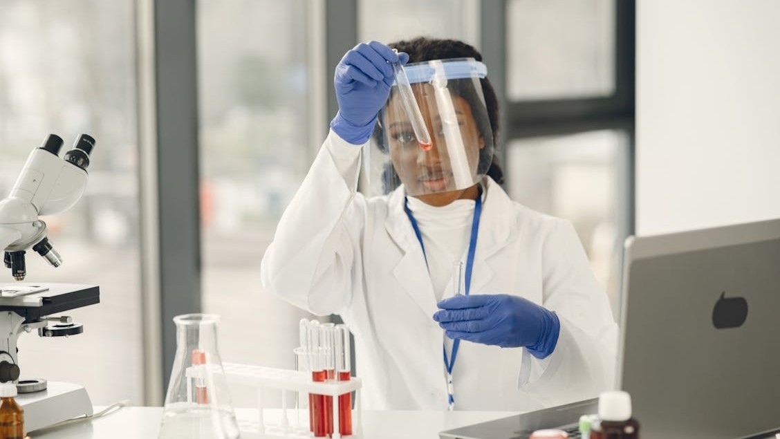 A scientist doing an experiment, furthering open science.