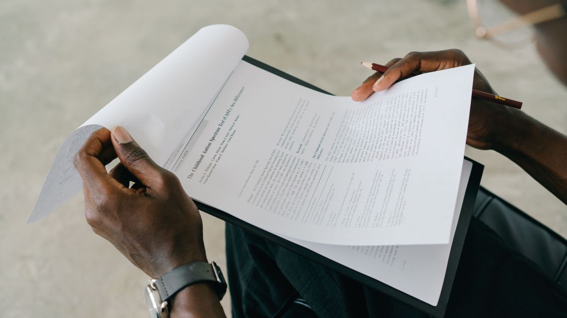 A person reviewing a research paper.