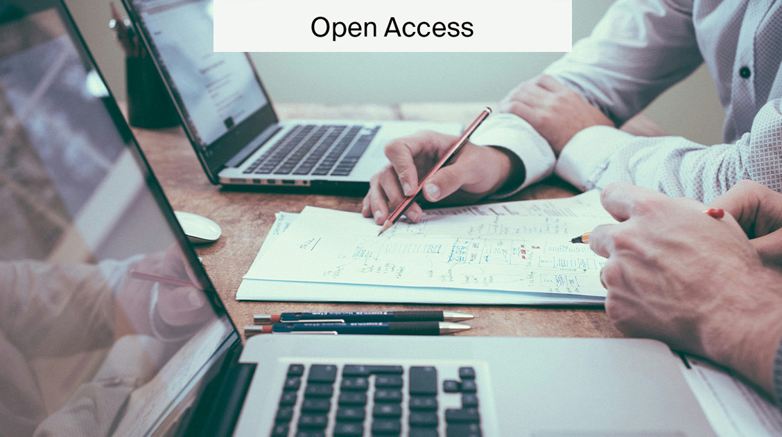 Two people looking at a laptop with a tag reading 'Open Access'.