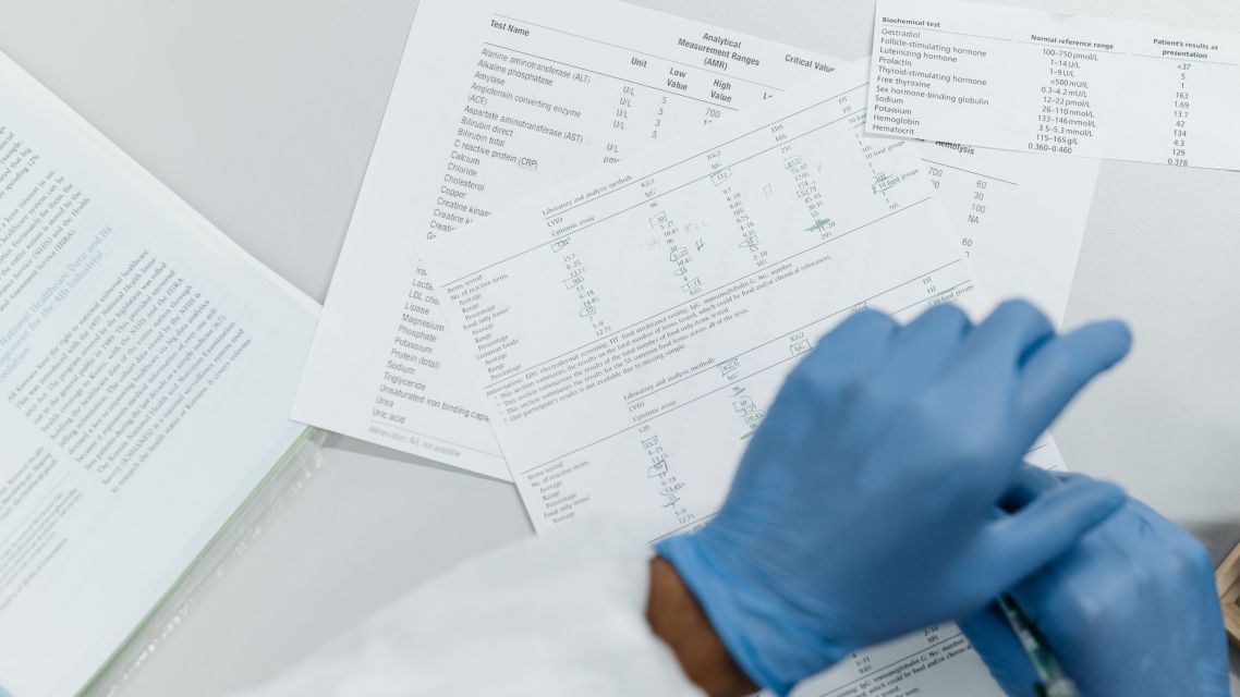 Scientist looking at data and results.